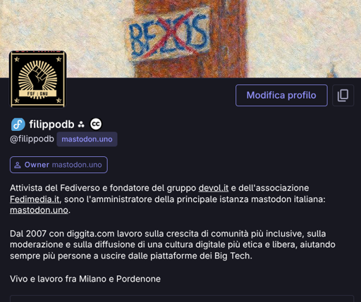  Screenshot of a social media profile page. The header features a textured background with the word "BEZOS" in blue and a red 'X' over it, alongside an avatar of a stylized fist with the text "FSF | GNU". The profile displays the name "filippodb", the handle "[@]filippodb mastodon.uno", and a label "Owner mastodon.uno". The bio text reads: "Attivista del Fediverso e fondatore del gruppo devol.it e dell'associazione Fedimedia.it, sono l'ammi l'amministratore della principale istanza mastodon italiana: mastodon.uno. Dal 2007 con diggita.com lavoro sulla crescita di comunità più inclusive, sulla moderazione e sulla diffusione di una cultura digitale più etica e libera, aiutando sempre più persone uscire dalle piattaforme dei Big Tech. Vivo e lavoro fra Milano e Pordenone". A "Modifica profilo" button and a copy icon are also visible.

