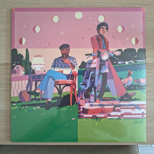 Fronte della copertina di un disco che ritrae Lucio Dalla e Lucio Battisti disegnati